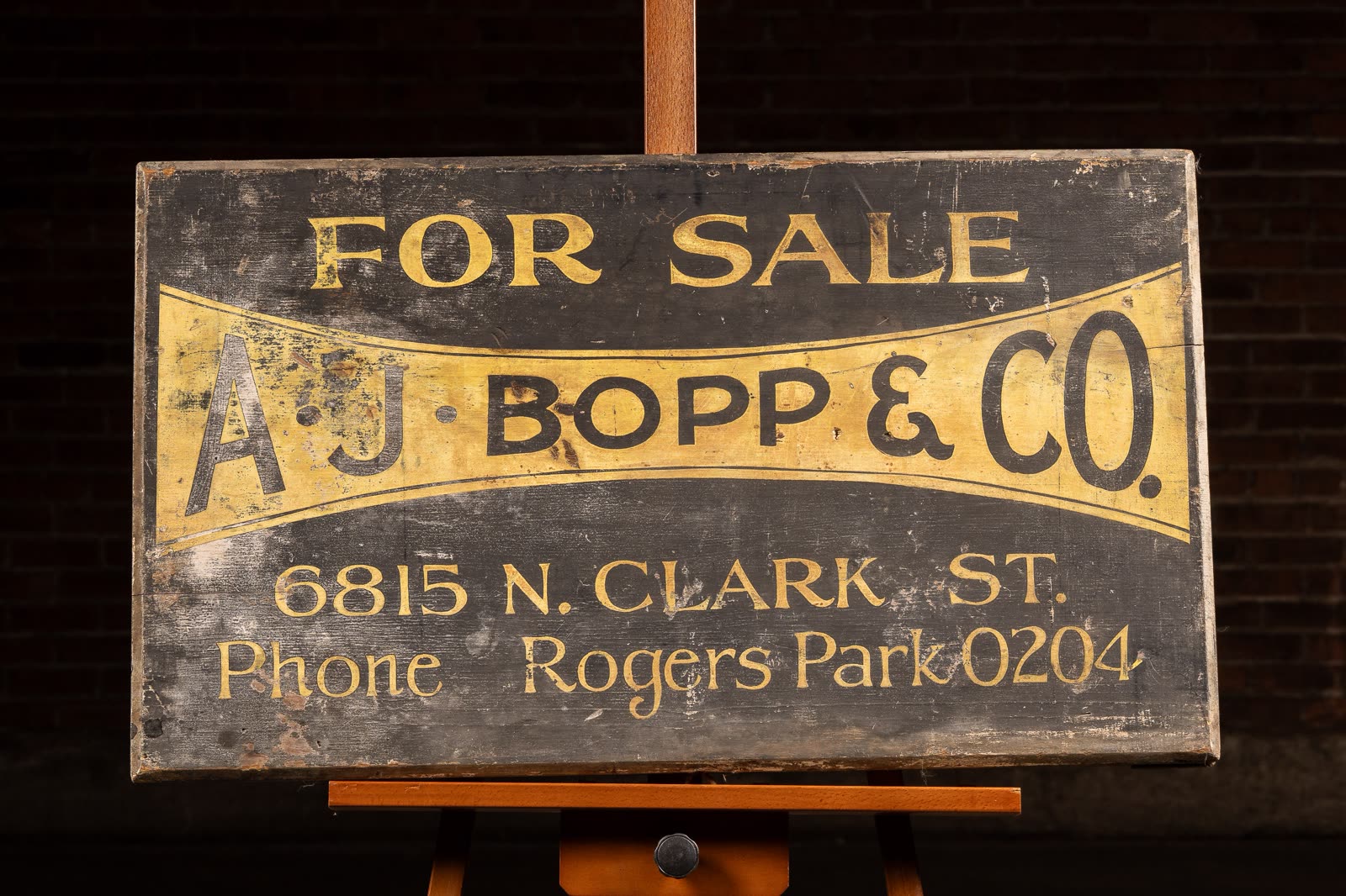Antique A.J. Bopp & Co. painted wood trade sign, circa 1920s